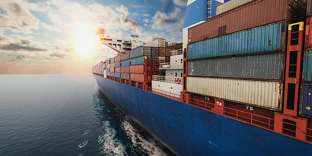 3D rendering of a large cargo ship with containers sailing on calm sea at sunset, symbolizing global trade, transport, export, and maritime business.